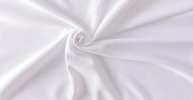 ein schick Hochzeit oder festlich Textil- Hintergrund gemacht von Weiß Satin- Stoff. Spiral- von Stoff. abstrakt Hintergrund. Design Layout. foto