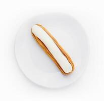 Dessert Eclair mit ausgepeitscht Sahne und Zucker Glasur foto