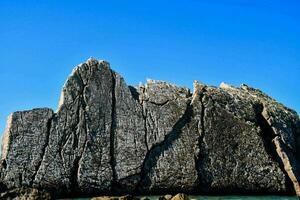 das Felsen Formation auf das Strand foto