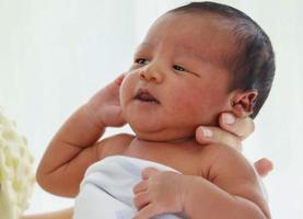 Porträt asiatische männliche Neugeborene niedlich foto