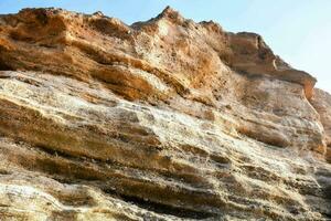 das Felsen Gesicht von ein Cliff foto