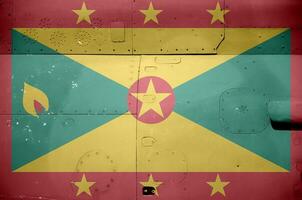 Grenada Flagge abgebildet auf Seite Teil von Militär- gepanzert Hubschrauber Nahaufnahme. Heer Kräfte Flugzeug konzeptionelle Hintergrund foto