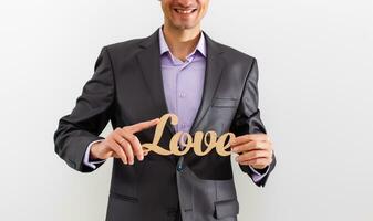 Geschäftsmann halten Liebe im Liebe Konzept foto