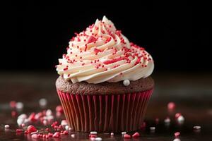 ai generiert Valentinstag Cupcake mit herzförmig Sträusel auf rot Hintergrund foto