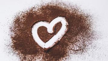 Herz in Kakao - Schokoladenherz foto