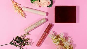 dekorativ Foto von drei Rosa Lippenstifte