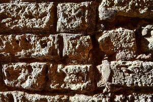 ein schließen oben von ein Backstein Mauer foto