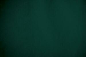 Grün Samt Stoff Textur benutzt wie Hintergrund. Smaragd Farbe Panne Stoff Hintergrund von Sanft und glatt Textil- Material. zerquetscht Samt .Luxus Smaragd Ton zum Seide.. foto