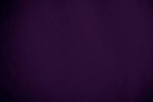 dunkel lila Samt Stoff Textur benutzt wie Hintergrund. violett Farbe Panne Stoff Hintergrund von Sanft und glatt Textil- Material. zerquetscht Samt .Luxus Magenta Ton zum Seide. foto