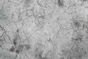 alter rissiger betonsteinputzwandhintergrund und texturstil foto