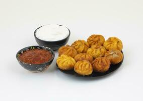 gebraten momos ist ein traditionell Knödel Essen von Nepal foto