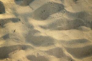 Sand Textur. abstrakt Sand Muster. Sommer- Hintergrund. foto