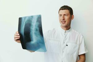 Mann der Chirurg Radiologe Gesundheit Weiß Röntgen Praktiker Stethoskop Medizin Mann Diagnose foto