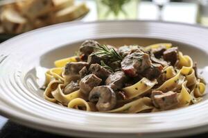 ai generiert Tagliatelle mit Würstchen und Steinpilz, Pasta mit Würstchen und Sommer- cep Pilz. generativ ai foto