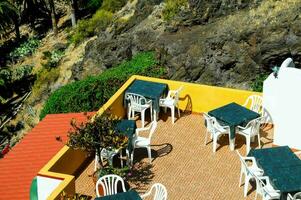 Privat Terrasse mit Tabellen und Stühle foto