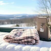 ai generiert ein flauschige Decke und ein heiß Wasser Flasche mit ein Winter Landschaft im das Hintergrund foto