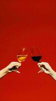 ai generiert zwei Hände halten Wein Brille im Vorderseite von ein rot Hintergrund, ai foto