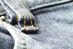 Nahansicht von Blau Jeans und Denim Einzelheiten. foto