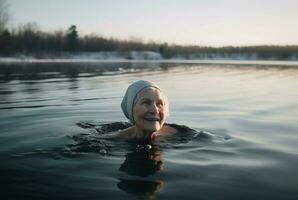 ai generiert reifen Senior Frau Schwimmen im kalt Teich Wasser. generieren ai foto
