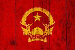Flagge und Mantel von Waffen von sozialistisch Republik von Vietnam auf ein texturiert Hintergrund. Konzept Collage. foto