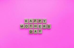 März 19, Mütter Tag, bemuttern Sonntag, ein minimalistisch Banner mit ein Inschrift im hölzern Briefe foto