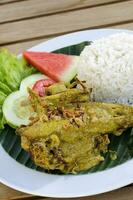 nasi bebek bumbu Madura oder maduresisch gewürzt Ente Reis foto