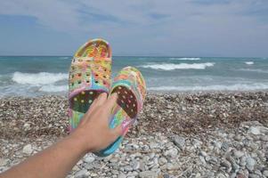 Korallenschuhe zum Schwimmen in der Ägäis foto