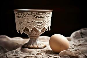 ai generiert Ostern Ei im ein Spitze Deckchen mit ein passend Ei Tasse foto