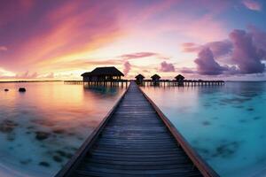 ai generiert Malediven Sonnenuntergang Strand Paradies mit bunt Himmel, Wasser Villen, und Ruhe foto