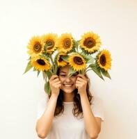 ai generiert Frau halten Sonnenblumen gegen ein Weiß Hintergrund foto