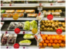 abstrakt verwischen Supermarkt, frisch Obst und Gemüse Zone zum Hintergrund foto