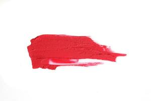 rot Lippenstift Swatch isoliert auf Weiß Hintergrund, kosmetisch Produkt, Bürste Schlaganfall, wischen Probe. foto