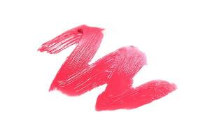 Rosa Lippenstift Swatch isoliert auf Weiß Hintergrund, kosmetisch Produkt, Bürste Schlaganfall, wischen Probe. foto