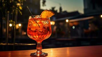 ai generiert generativ ai, Glas von Aperol Spritz auf hölzern Tabelle mit verwischen Hintergrund mit Beleuchtung von Straße Bar, Cafe oder Restaurant foto