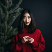 ai generiert Frau mit rot Sweatshirt halten Weihnachten Baum, foto