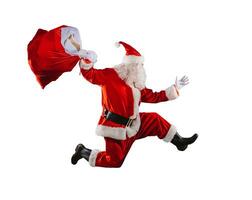 Santa claus läuft schnell zu liefern alle Geschenke zum Weihnachten foto