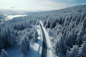 ai generiert oben Antenne Aussicht von Schnee Berg Landschaft mit Bäume und Straße foto