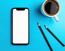 ai generiert oben Aussicht von ein spotten oben Handy, Mobiltelefon Telefon auf Blau Hintergrund mit Kaffee Tasse und Stift foto