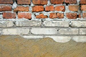 rot und Weiß alt Backstein Mauer Hintergrund. foto