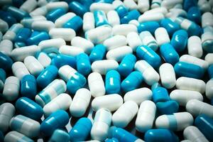 ai generiert Gesundheitswesen Palette Blau Weiß Antibiotikum Kapseln symbolisieren pharmazeutische Industrie Konzepte foto