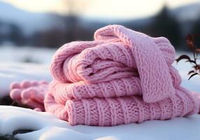 ai generiert warm Rosa wolle Schal im das Schnee. Winter Zeit. foto