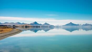 ai generiert majestätisch Berg Angebot spiegelt im still Blau Wasser generiert durch ai foto