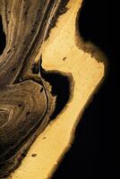 Flüssigkeit golden Welle auf schwarz. abstrakt Flüssigkeit Marmor Hintergrund oder Textur. Acryl Flüssigkeit Kunst. Digital Dekor foto