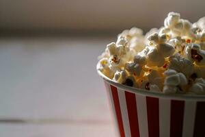 ai generiert Popcorn im rot gestreift Tasse foto