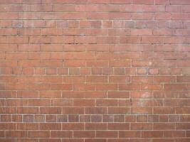 Hintergrund der roten Backsteinmauer foto