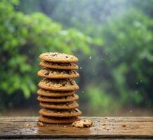 ai generiert Schokolade Chip Kekse auf hölzern Tabelle mit Regen Tropfen auf Hintergrund. foto