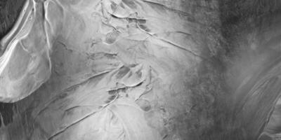 abstrakt schwarz Wand, Stein Textur zum das Hintergrund. abstrakt betrübt Jahrgang Grunge. schwarz Grunge Textur. schwarz Stein Hintergrund. schwarz und Weiß Hintergrund foto