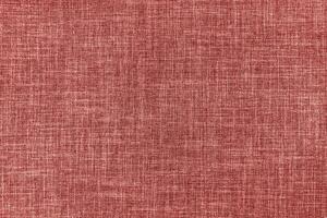 Textur von rot Polster Stoff. dekorativ Textil- Hintergrund foto