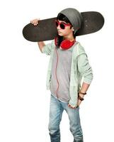 Teen Junge mit Skateboard foto