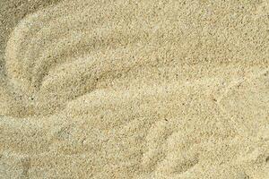 abstrakt körnig Strand Sand Textur Hintergrund foto